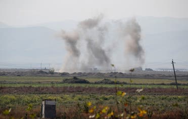 Smoke rises as targets are hit by shelling during the fighting over the breakaway region of Nagorno-Karabakh near the city of Terter, Azerbaijan October 23, 2020. (Reuters)