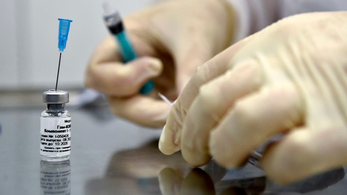 A nurse prepares to inoculate a volunteer with Russia’s new coronavirus vaccine in a post-registration trials at a clinic in Moscow on September 10, 2020. (Natalia Kolesnikova/AFP)