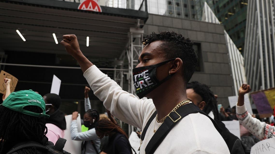 People protest against recent violence at demonstrations in Nigeria on October 21, 2020, in New York City. (AP)
