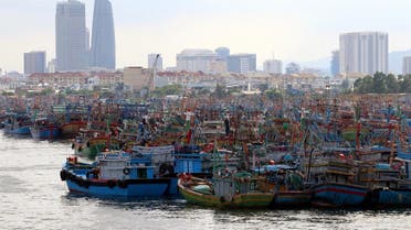Fishing boats are seen at a port after returning to avoid Molave typhoon in Da Nang city, Vietnam October 26, 2020. (Reuters)