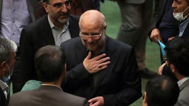 Iranian Mohamad Bagher Ghalibaf (C) stands among members of the parliament after being elected as parliament speaker at the Iranian parliament in Tehran on May 28, 2020. (AFP)