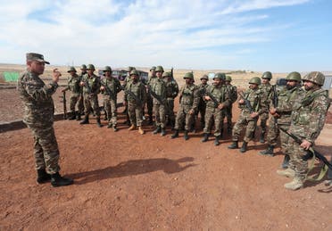 Armenian reservists listen to instructions while undergoing training at a firing range before their departure for the front line in the course of a military conflict with the armed forces of Azerbaijan over the breakaway region of Nagorno-Karabakh, near Yerevan, Armenia October 25, 2020. (Reuters)
