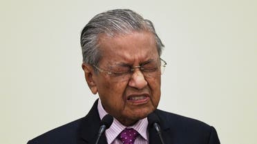 Malaysia's former Prime Minister Mahathir Mohamad answers questions during a press conference at the Prime Minister's Office in Putrajaya on February 27, 2020. (AFP)