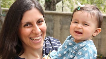 An undated handout image released by the Free Nazanin campaign in London on June 10, 2016 shows Nazanin Zaghari-Ratcliffe (L) posing for a photograph with her daughter Gabriella. (AFP)