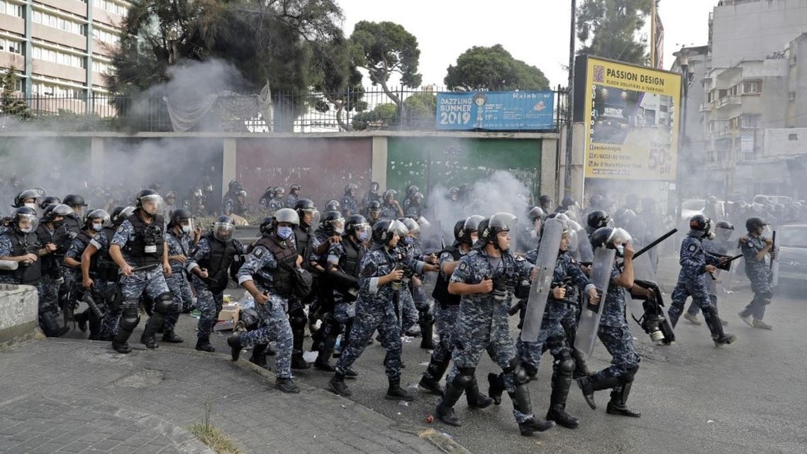 Members of Lebanon's security forces deploy amid clashes with demonstrators at a rally of demonstrators protesting comments by the French President seen as offensive to Islam, near the residence of the French Ambassador in the capital Beirut, on October 30, 2020. (AFP)