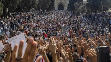 Palestinians gather to protest against the French president, in the al-Aqsa mosque compound, in the Old City of Jerusalem on October 30, 2020. (AFP)
