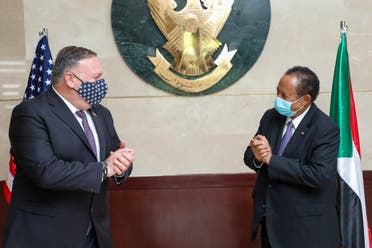 US Secretary of State Mike Pompeo (L) greeting Sudanese Prime Minister Abdalla Hamdok (R) in Khartoum. (File photo: AFP)