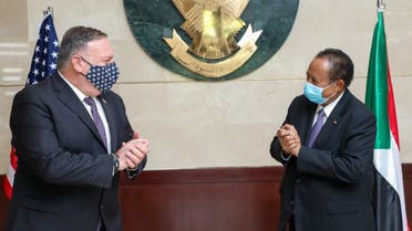 US Secretary of State Mike Pompeo (L) greeting Sudanese Prime Minister Abdalla Hamdok (R) in Khartoum. (AFP)