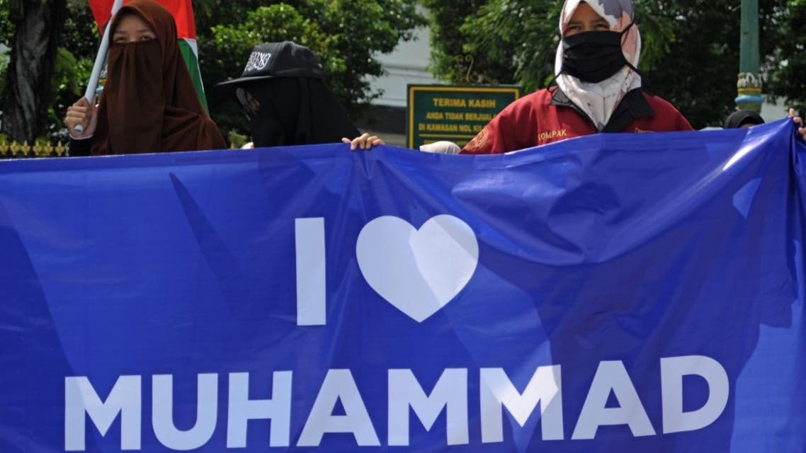 Muslim protesters gather during a demonstration against French President Emmanuel Macron for his comments over the Prophet Mohammed caricatures in Yogyakarta on October 30, 2020. (AFP)