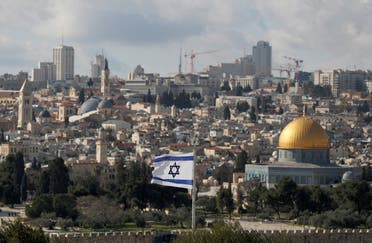 An Israeli flag is seen near the Dome of the Rock, located in East Jerusalem on January 24, 2020. (Reuters)