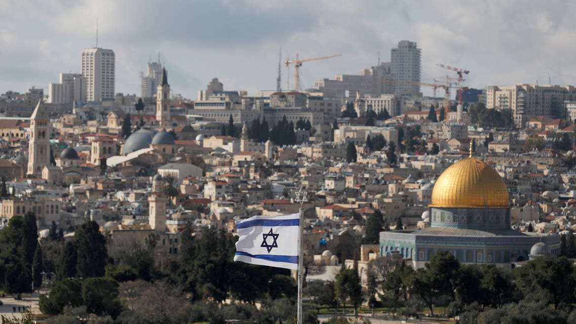 An Israeli flag is seen near the Dome of the Rock, located in Jerusalem's Old City on the compound known to Muslims as Noble Sanctuary and to Jews as Temple Mount, January 24, 2020. (Reuters)