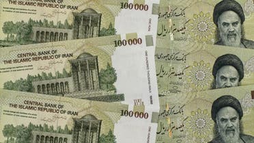 Iran's biggest denomination currency 100000 Rials (8.9 US dollars), with a portrait of Iran's late founder of Islamic Republic Ayatollah Ruhollah Khomeini, in Tehran. (File photo: AFP)