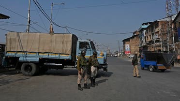 Indian government forces stand guard at a road check point during a one-day strike called by the All Parties Hurriyat Conference (APHC) against Indian government decision to open Kashmir land for all Indians, in Srinagar, October 31, 2020. (Tauseef Mustafa/AFP)