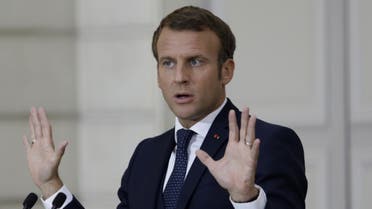 French President Emmanuel Macron speaks during a press conference on September 27, 2020 in Paris. (AFP)