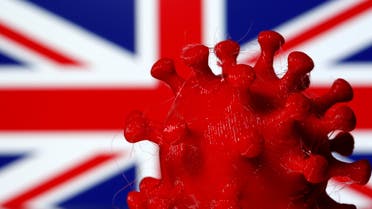 A 3D-printed coronavirus model is seen in front of a British flag on display in this illustration taken March 25, 2020. (Reuters)