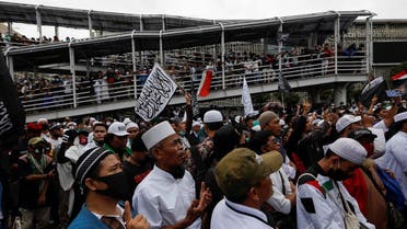 People gather during a protest against the comments of French President Emmanuel Macron considered insulting to the Prophet of Muhammad and Muslims, on the main road near the French Embassy in Jakarta, Indonesia, on November 2, 2020. (Reuters)