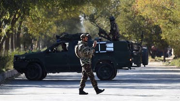 A security personnel stands guard outside the Kabul University in Kabul on November 2, 2020. (Wakil Kohsar/AFP)