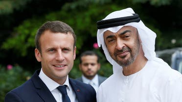 French President Emmanuel Macron accompanies Abu Dhabi's Crown Prince Sheikh Mohammed bin Zayed al-Nahyan after a meeting about Qatar crisis at the Elysee Place in Paris. (reuters)