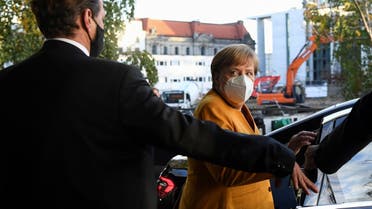 German Chancellor Angela Merkel leaves at the end of a news conference at the Bundespressekonferenz after discussing with her cabinet new measures to contain the spread of the coronavirus, in Berlin, Germany, on November 2, 2020. (Reuters)