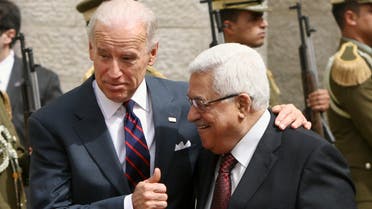 Then-US Vice President Joe Biden, left, gestures as he walks with Palestinian President Mahmoud Abbas ahead of their meeting in Ramallah on March 10, 2010. (File photo: AP)