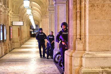 Armed police patrol at a passage near the opera in central Vienna on November 2, 2020, following a shooting near a synagogue. (Joe Klamar/AFP)