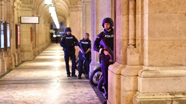 Armed police patrol at a passage near the opera in central Vienna on November 2, 2020, following a shooting near a synagogue. (Joe Klamar/AFP)