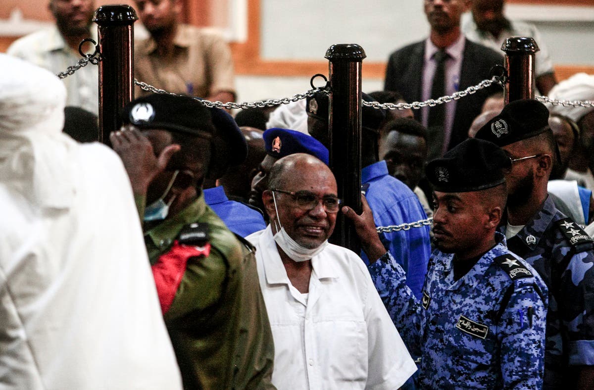 Omar al-Bashir (C) appears during his trial in Khartoum, Sudan, November 3, 2020. (Ebrahim Hamid/AFP)