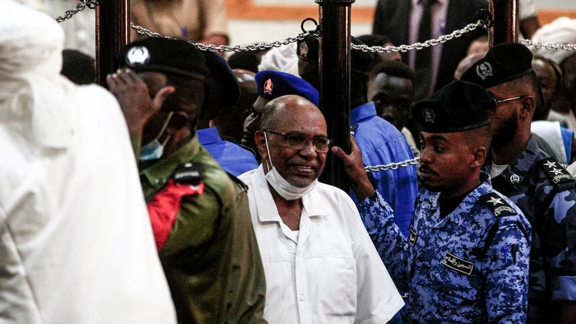 Omar al-Bashir (C) appears during his trial in Khartoum, Sudan, November 3, 2020. (Ebrahim Hamid/AFP)