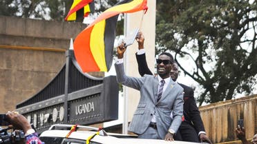 Ugandan pop star Kyagulanyi Ssentamu, better known as Bobi Wine, center, gestures to supporters in Kampala, Uganda. (File photo: AP)