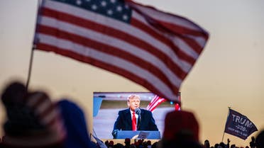 US President Donald Trump, rally, American flag - US Elections (AFP)