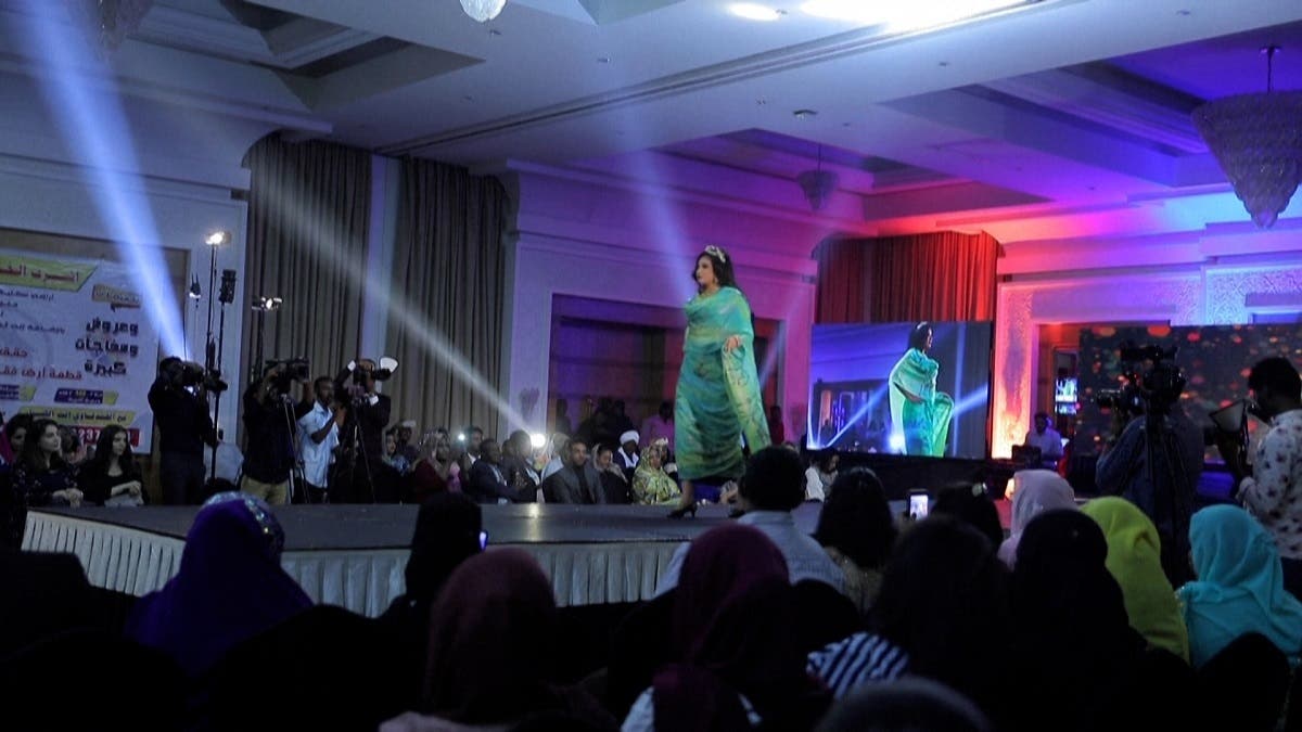 A female model parading down the catwalk during a fashion show in Khartoum, Nov. 4, 2020. (AFP)
