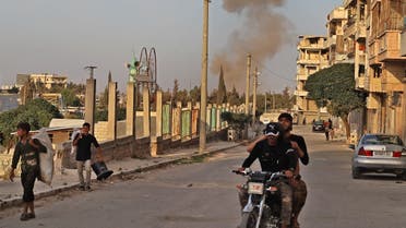 A smoke plume rises following an explosion in the town of Ariha in the opposition-held northwestern Idlib province on October 20, 2020. (Abdulaziz Ketaz/AFP)