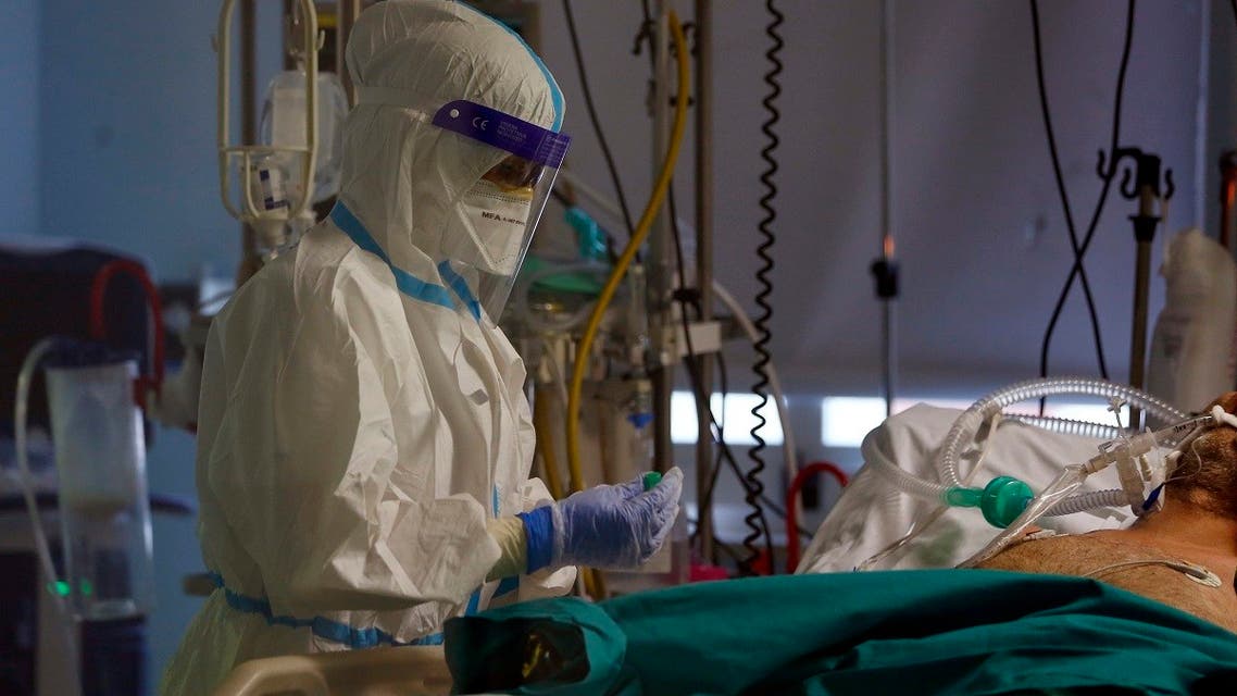 A medical staff tends to a patient inside the COVID-19 intensive care unit at the San Filippo Neri hospital in Rome, on November 3, 2020. (AP)