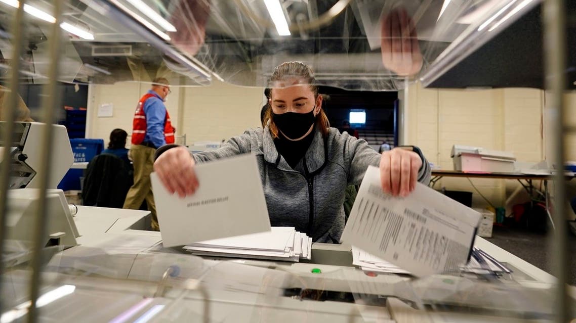 An election worker opens mail-in and absentee ballots for the 2020 General Election, Nov. 3, 2020, in West Chester, Pennsylvania. (AP)