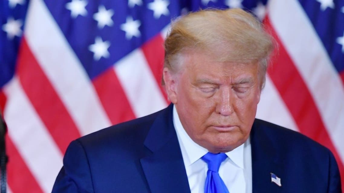 US President Donald Trump looks on after speaking during election night in the East Room of the White House in Washington, DC, early on November 4, 2020. (AFP)