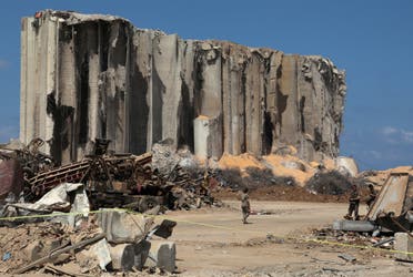 Members of the Lebanese army walk near the damaged grain silo during a joint effort with the French military to clear the rubble from port of Beirut following the explosion, as part of a tour organized for media and journalists in Beirut, Lebanon August 26, 2020. (Reuters)