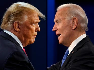 US President Donald Trump (L) and Democratic Presidential candidate and former US Vice President Joe Biden during the final presidential debate at Belmont University in Nashville, Tennessee, on October 22, 2020. (AFP)