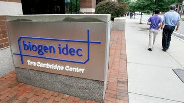 Ppedestrians pass Biogen Idec Inc. headquarters in Cambridge, Mass. Biogen Inc. (File: AP)