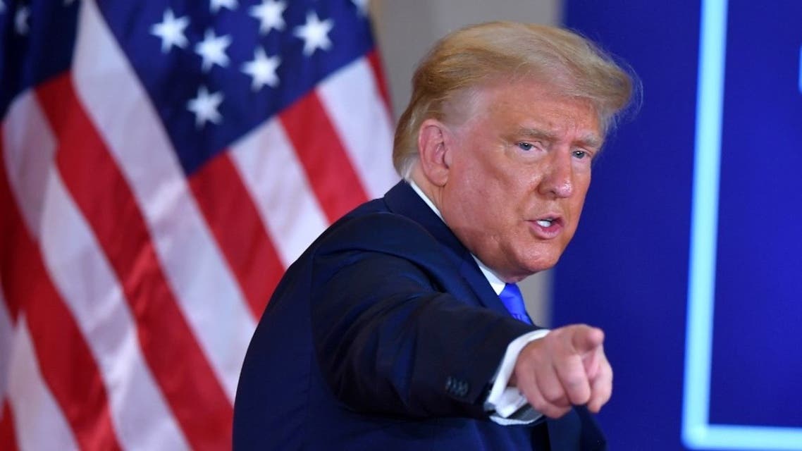 US President Donald Trump gestures after speaking during election night in the East Room of the White House in Washington, DC, early on November 4, 2020. (AFP)