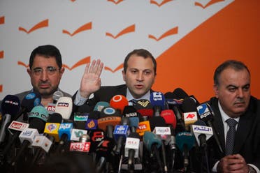 Gebran Bassil announces a resignation statement as ministers from the Shia duo of Hezbollah and Amal Movement listen, Jan. 12, 2011. This forced the collapse of Saad Hariri’s government. (Reuters)
