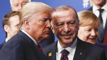 US President Donald Trump (L) and Turkey's President Recep Tayyip Erdogan (R) at the NATO summit on December 4, 2019. (AFP)