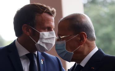 French President Emmanuel Macron and Lebanon's President Michel Aoun wear face masks as they arrives to attend a meeting at the presidential palace in Baabda, Lebanon September 1, 2020. (File photo: Reuters)