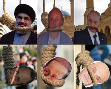 صور لسياسيين لبنانيين على حبال المشانق ومن بينهم باسيل رفعت من قبل متظاهرين (أرشيفية- فرانس برس)