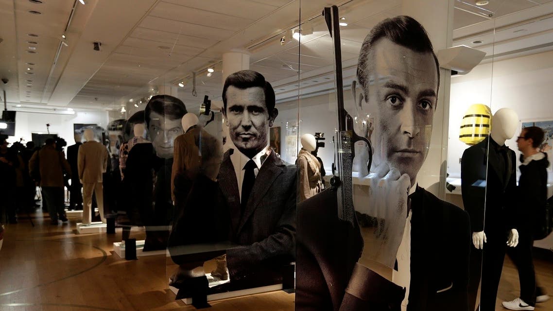 A general view of the James Bond movie memorabilia charity auction at Christie's auction house during the press pre-view showing large portraits of the actors who have portrayed the famous movie icon James Bond, with Sean Connery. (AP)
