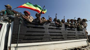 Members of Amhara region militias ride on their truck as they head to face the Tigray People’s Liberation Front (TPLF), in Sanja, Amhara region near a border with Tigray, Ethiopia November 9, 2020. (Reuters/Tiksa Negeri)