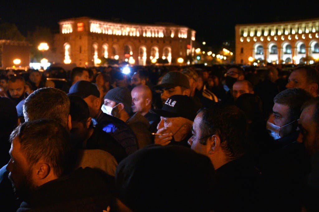 Armenians protest against the country's agreement to end fighting with Azerbaijan over the disputed Nagorno-Karabakh region inside the government headquarters in Yerevan on November 10, 2020. (AFP)