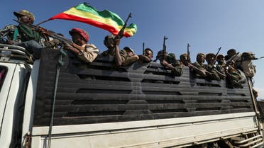 Members of Amhara region militias ride on their truck as they head to face the TPLF, in Sanja, Amhara region near a border with Tigray, Ethiopia Nov. 9, 2020. (Reuters)