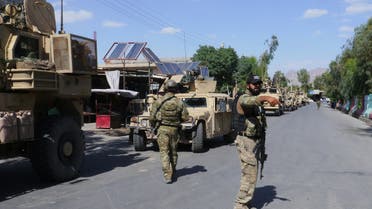 In this photograph taken on May 19, 2018, Afghan security forces patrol, after recapturing control of the city from Taliban militants, in Farah. Afghan commandos and US air strikes have driven the Taliban to the outskirts of Farah city, officials said May 16, after a day-long battle to prevent the insurgents from seizing the western provincial capital.