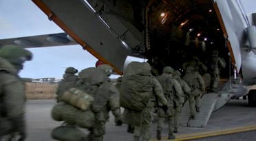A still image from a video released by the Russian Defence Ministry shows Russian peacekeepers boarding a plane before departing for the region of Nagorno-Karabakh at an airdrome in Ulyanovsk, Russia November 10, 2020. (Reuters)