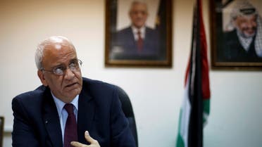 Palestinian chief negotiator Saeb Erakat gestures during his interview with Reuters in the West Bank city of Ramallah August 11, 2013. (Reuters)